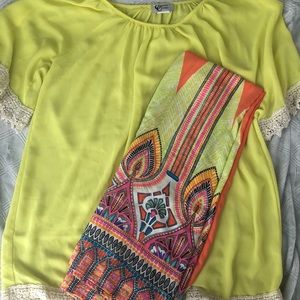 Yellow and lace shirt with bright patterned pants